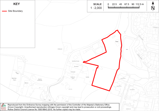 BX23 Site-location map showing a proposed site boundary within a rural and residential area. Red outline marks an irregular parcel, with key, 1:2,000 scale bar, north arrow, roads, buildings, and surrounding field labels.

