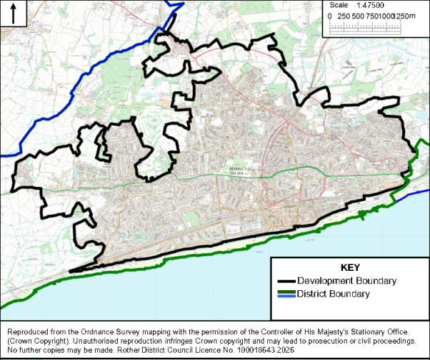 Map outlining a coastal urban district, using Ordnance Survey mapping to show development limits and administrative extent. Black Development Boundary traces built-up area, blue District Boundary marks outer jurisdiction, and green coastal edge borders light-blue sea; 1:47,500 scale bar and labeled key provide reference.