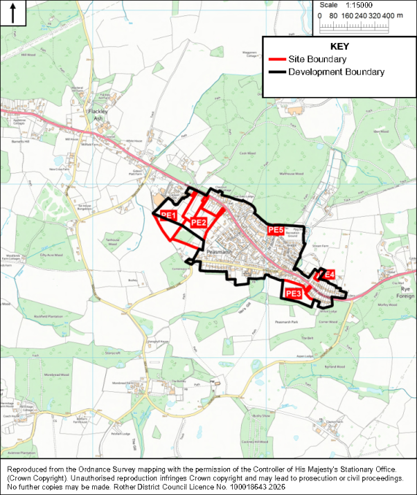 Map showing proposed site locations and development boundary around Peasmarsh, with roads, fields, woodland, water features, and nearby villages for planning context. Red outlines mark five sites labeled PE1–PE5, while a thick black line marks development boundary; key, north arrow, and 1:15,000 scale support interpretation.